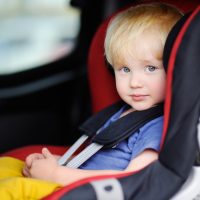 Blonde-boy-in-car-seat[1]