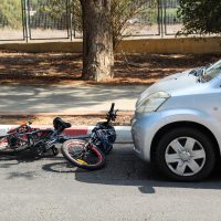A traffic accident between electric bicycle and car