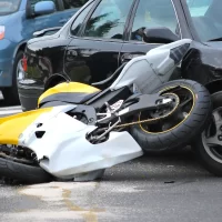 a-yellow-and-white-motorcycle-is-overturned[1]